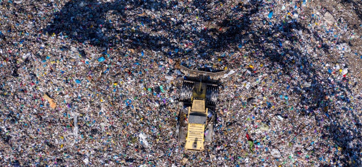 aerial-drone-view-of-bulldozer-working-on-landfill-AZHR6WE (1)